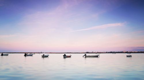 Boats in calm sea