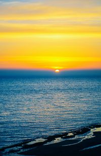 Scenic view of sunset over sea