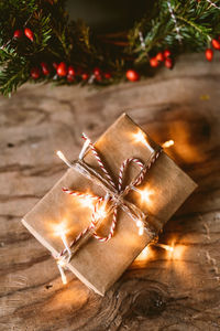 Close-up of illuminated christmas tree on table