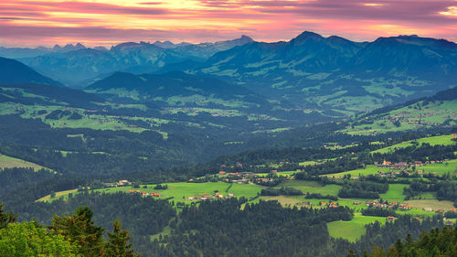 Scenic view of landscape against sky during sunset