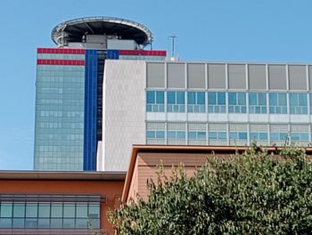 Low angle view of modern building against clear sky