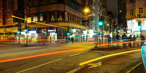 Light trails on city street at night