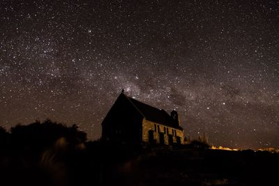 Low angle view of building against sky at night