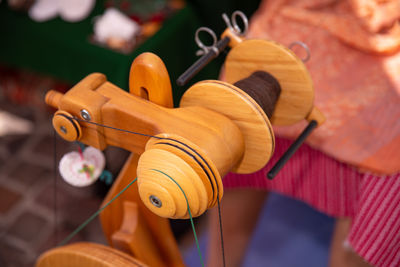 Wooden spinning wheel, handcrafted spinning tool, traditional textile spinning device