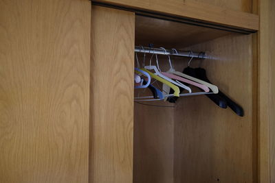 Coathangers hanging in closet