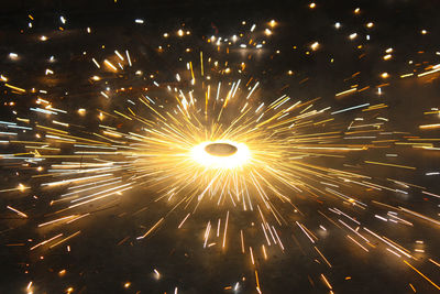 Firework display at night