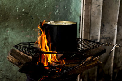 Close-up of fire on log