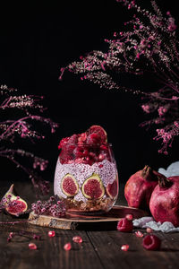 High angle view of berries on table against trees