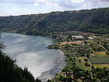 High angle view of river amidst landscape against sky