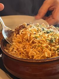 Midsection of man preparing food