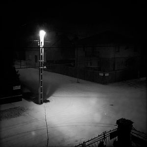Illuminated street light at night