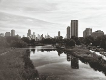 View of city against cloudy sky