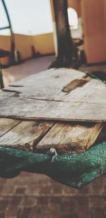 Close-up of old wooden table