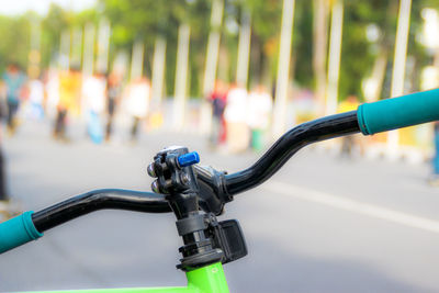 Cropped image of bicycle on road