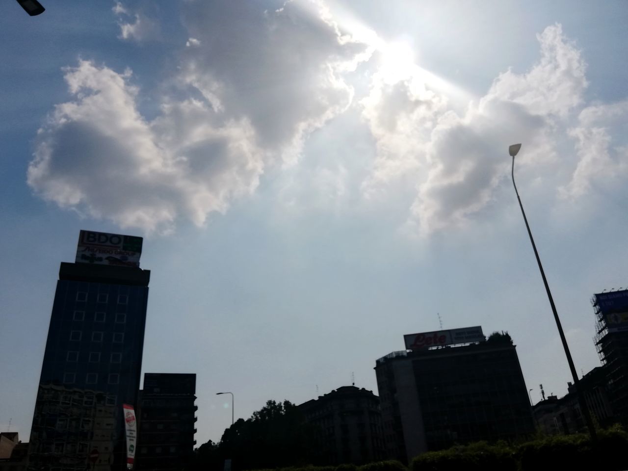 LOW ANGLE VIEW OF BUILDINGS AGAINST SKY IN CITY