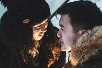 Portrait of young couple in snow