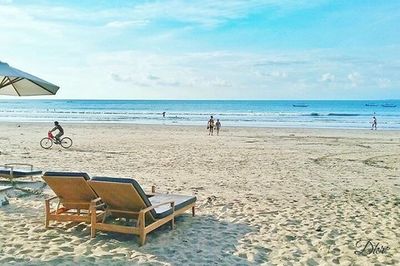 View of chairs on beach