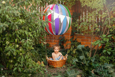 Portrait of girl holding basket