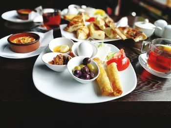 Close-up of various food served on table
