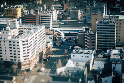 High angle view of street amidst buildings in city