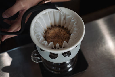 High angle view of coffee cup on table