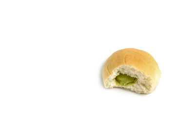 Close-up of bread against white background