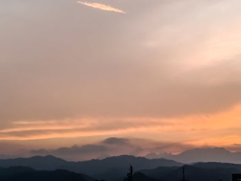 View of the sky and mountains at sunset