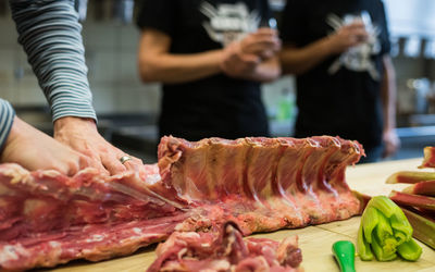 Midsection of man preparing food