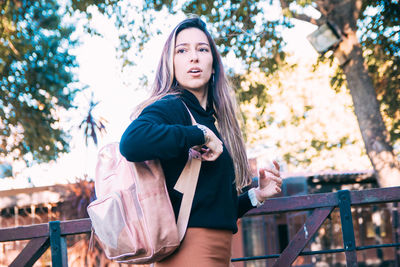 Portrait of highschool teen girl wearing backpack