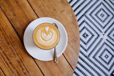 High angle view of cappuccino on table