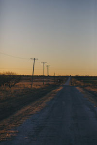 Road against sky during sunset