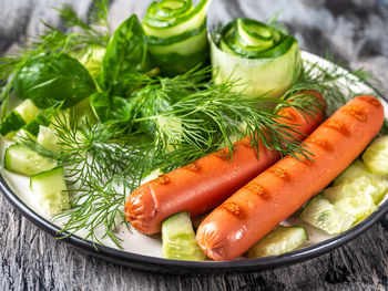 High angle view of vegetables in plate on table