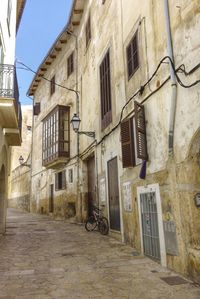 Narrow alley with buildings in background