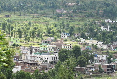 High angle view of townscape and trees