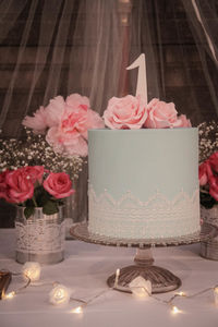 Close-up of pink roses on table