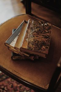 High angle view of old books on table