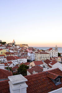 Town against clear sky