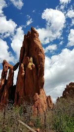 Rock formation against cloudy sky at garden of the gods