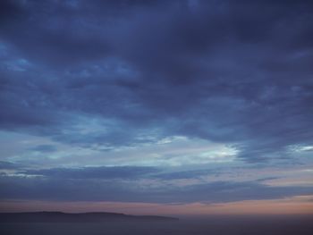 Scenic view of storm clouds over sea