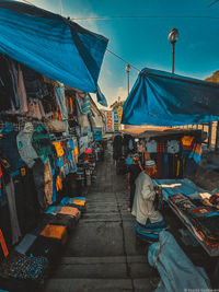 Street market amidst buildings in city