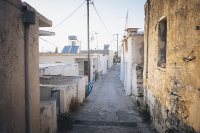 Narrow alley along buildings