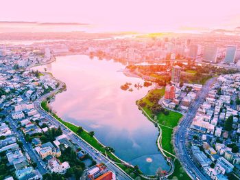 High angle view of river and cityscape 