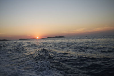 Scenic view of sea against sky during sunset
