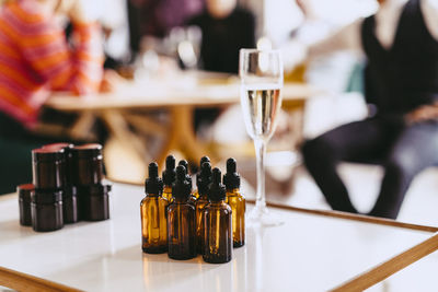 Bottles of essential oils samples arranged on table during event at convention center