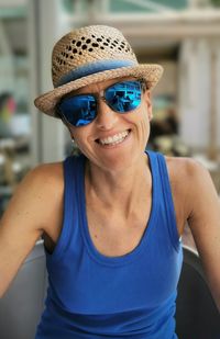 Smiling woman in blue