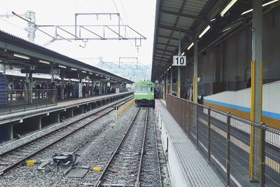 Railroad station platform against sky