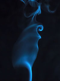 Close-up of smoke against black background