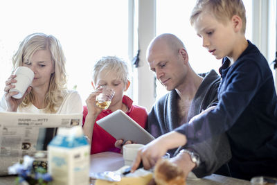 Family having breakfast together