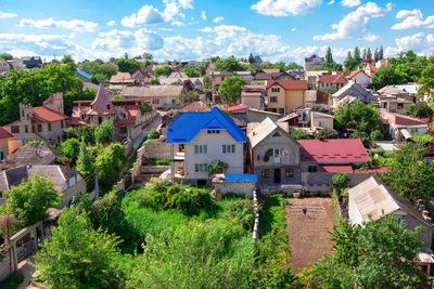 Suburban residential district with cottages . houses rooftops view