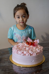 Asian cute little princess at 3rd birthday party.